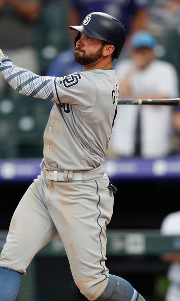 Padres edge Rockies in another slugfest at Coors Field